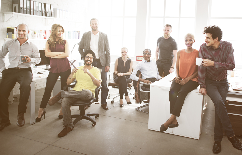 diverse professionals relaxed in office